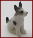 HAK566A Tiny Ceramic Sitting Dog Ornament